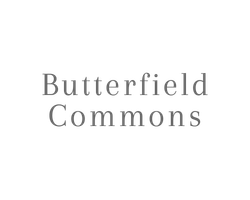 The image features the text "Butterfield Commons" in a grey font.
